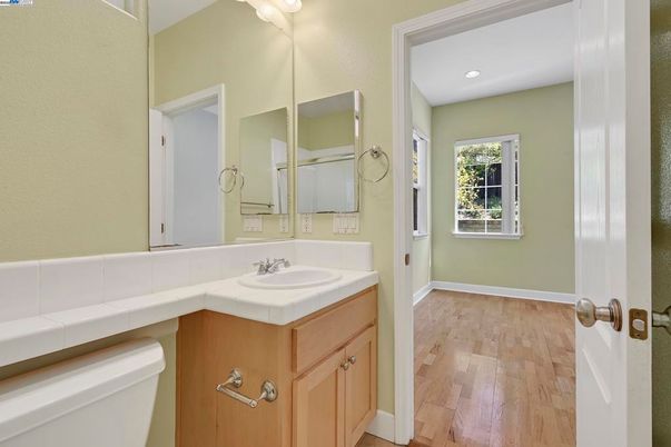 Bathroom, Interior, Recessed Lighting, Tile Countertops, Wood Texture Flooring