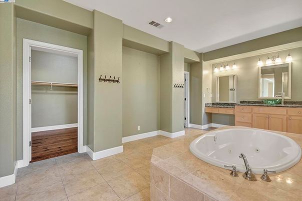 Bathroom, Dual Sink Vanities, Interior, Recessed Lighting, Wood Texture Flooring