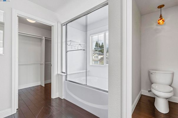 Bathroom, Glass Shower, Interior, Pendant Lights, Walk-in Closets, Wood Texture Flooring
