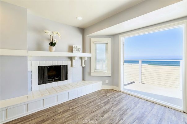 Empty room, Fireplace, Interior, Recessed Lighting, Water, Wood Texture Flooring