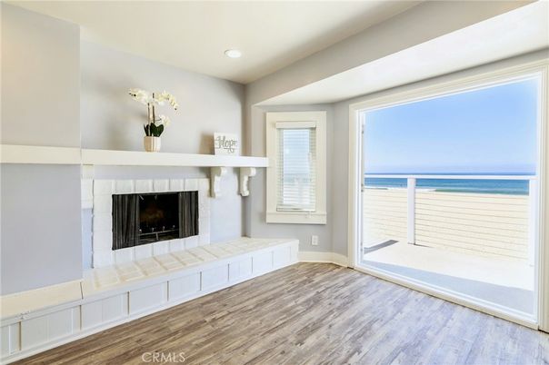 Empty room, Fireplace, Interior, Recessed Lighting, Water, Wood Texture Flooring