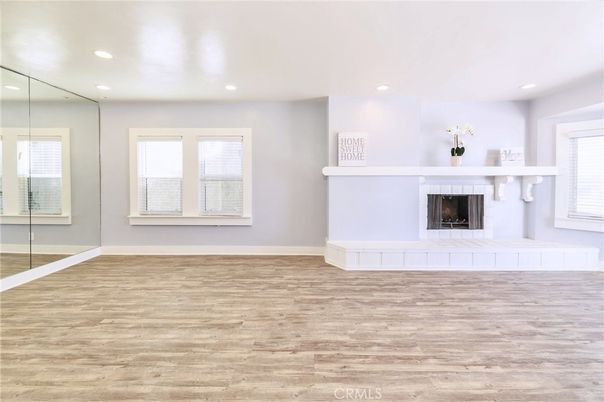 Empty room, Fireplace, Interior, Recessed Lighting, Wood Texture Flooring