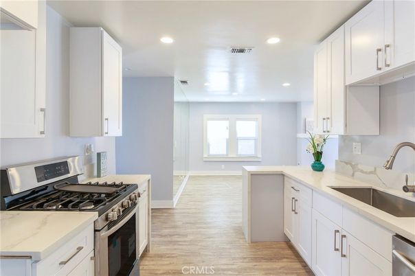 Interior, Kitchen, Recessed Lighting, Stainless Steel Appliances, Wood Texture Flooring
