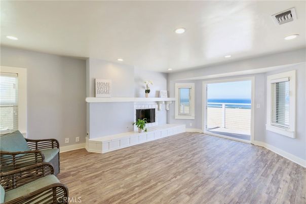 Fireplace, Interior, Recessed Lighting, Water, Wood Texture Flooring
