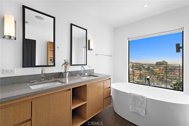 Bathroom, Dual Sink Vanities, Free Standing Baths, Interior, Recessed Lighting, Wood Texture Flooring