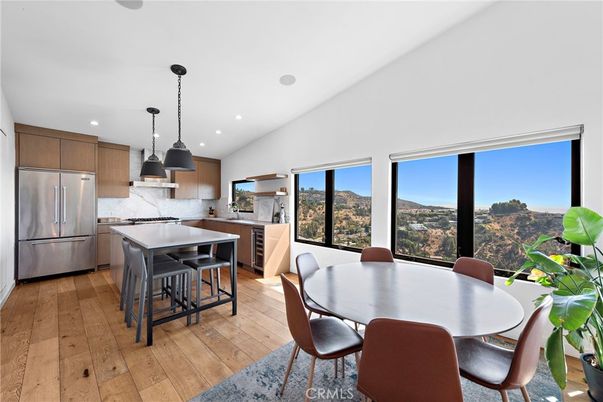 Dining room, Interior, Kitchen, Pendant Lights, Recessed Lighting, Stainless Steel Appliances, Wood Texture Flooring