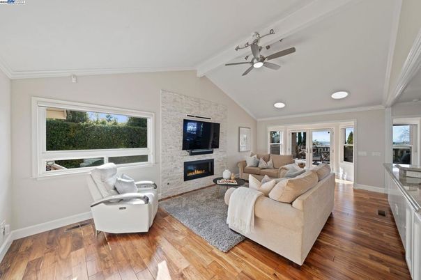 Fireplace, Interior, Living room, Recessed Lighting, Stone Walls, Wood Texture Flooring