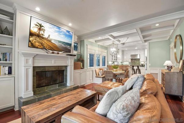 Chandelier, Dining room, Fireplace, Interior, Kitchen, Living room, Pendant Lights, Recessed Lighting, Stainless Steel Appliances, Wood Texture Flooring