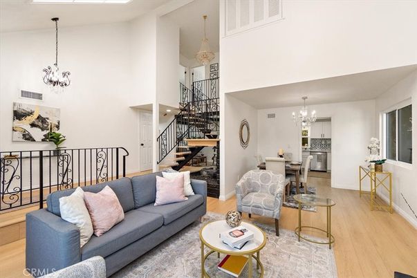 Chandelier, Dining room, Interior, Kitchen, Living room, Pendant Lights, Stainless Steel Appliances, Wood Texture Flooring