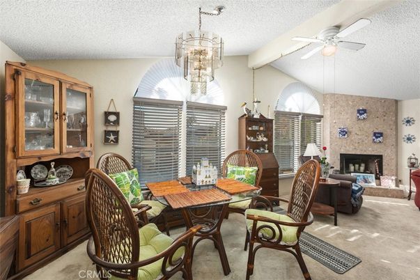 Chandelier, Dining room, Fireplace, Interior, Living room, Stone Walls