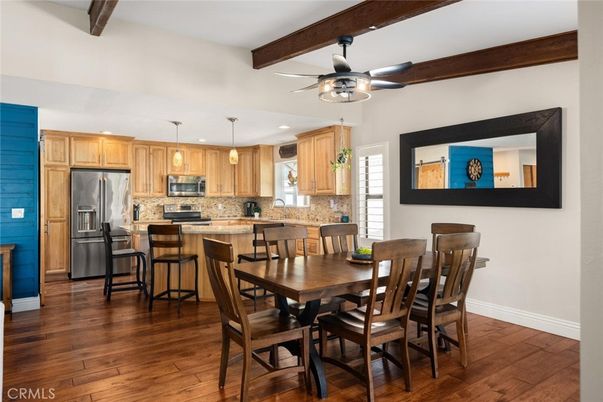 Dining room, Interior, Kitchen, Pendant Lights, Recessed Lighting, Stainless Steel Appliances, Wooden Beams, Wood Texture Flooring