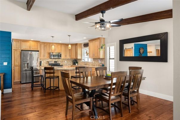 Dining room, Interior, Kitchen, Pendant Lights, Recessed Lighting, Stainless Steel Appliances, Wooden Beams, Wood Texture Flooring