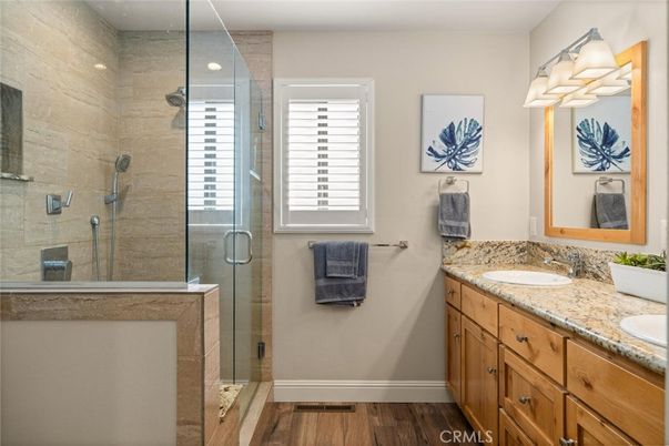 Bathroom, Dual Sink Vanities, Glass Shower, Interior, Wood Texture Flooring