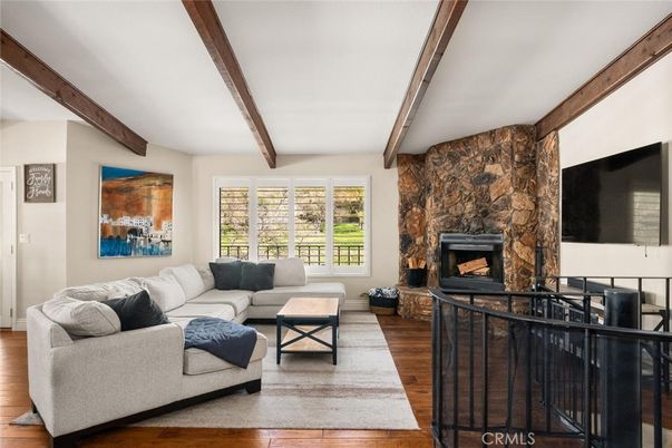 Fireplace, Interior, Living room, Stone Walls, Wooden Beams, Wood Texture Flooring