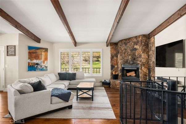 Fireplace, Interior, Living room, Stone Walls, Wooden Beams, Wood Texture Flooring