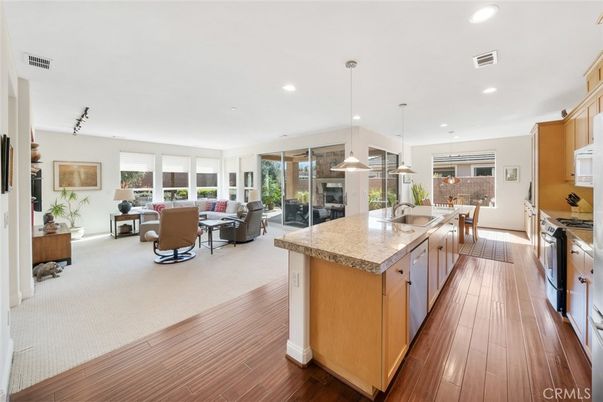 Dining room, Interior, Kitchen, Living room, Pendant Lights, Recessed Lighting, Stainless Steel Appliances, Wood Texture Flooring