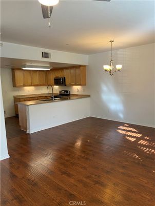 Chandelier, Empty room, Interior, Kitchen, Stainless Steel Appliances, Wood Texture Flooring