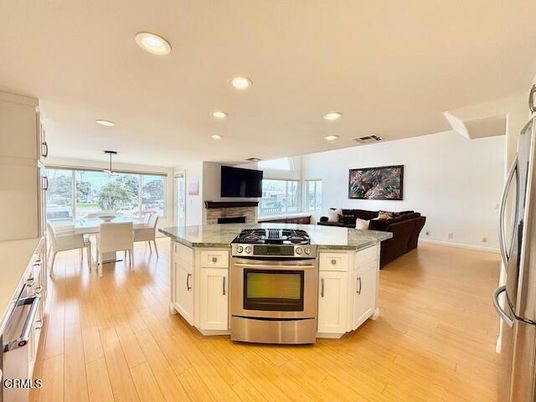 Dining room, Interior, Kitchen, Living room, Pendant Lights, Recessed Lighting, Stainless Steel Appliances, Wood Texture Flooring