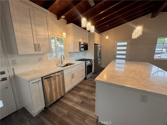 Chandelier, Interior, Kitchen, Pendant Lights, Stainless Steel Appliances, Wooden Beams, Wooden Ceilings, Wood Texture Flooring