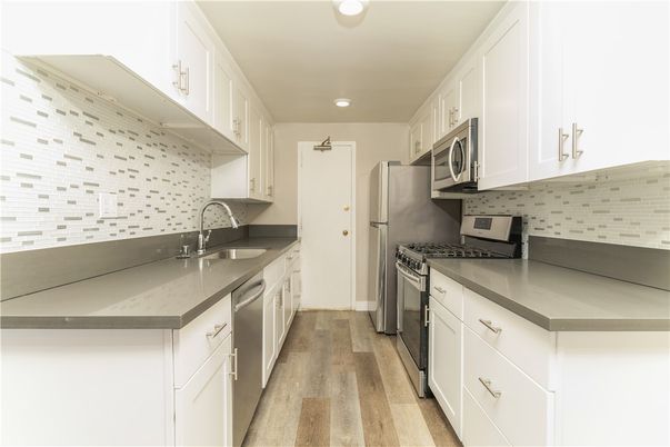 Interior, Kitchen, Recessed Lighting, Stainless Steel Appliances, Wood Texture Flooring