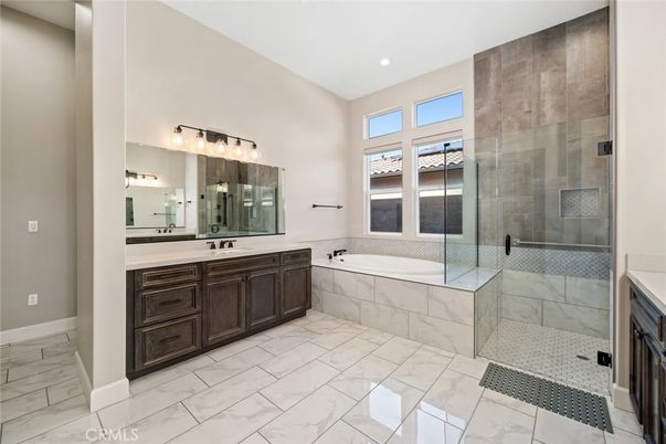 Bathroom, Dual Sink Vanities, Glass Shower, Interior, Marble, Recessed Lighting
