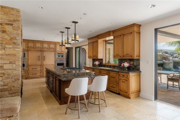 Interior, Kitchen, Pendant Lights, Recessed Lighting, Stainless Steel Appliances, Stone Walls