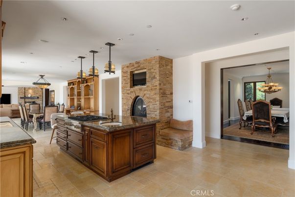 Chandelier, Dining room, Fireplace, Interior, Kitchen, Pendant Lights, Recessed Lighting, Stone Walls