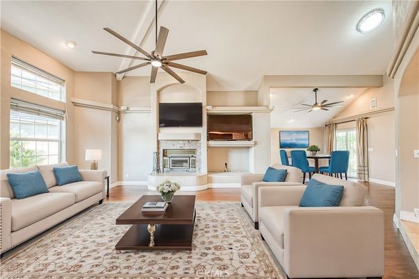 Dining room, Fireplace, Interior, Living room, Recessed Lighting, Wood Texture Flooring
