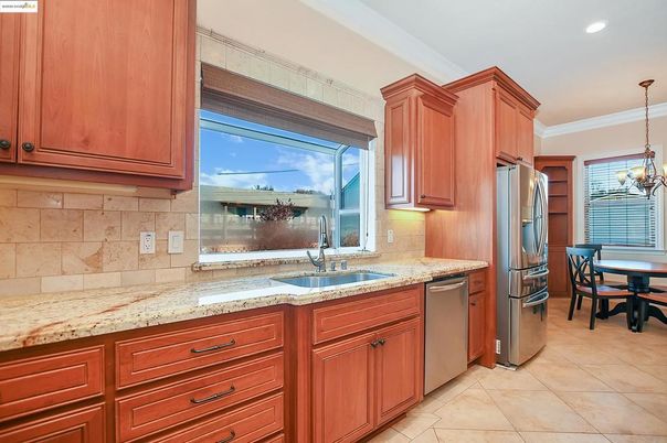 Chandelier, Dining room, Interior, Kitchen, Pendant Lights, Recessed Lighting, Stainless Steel Appliances