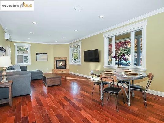 Dining room, Fireplace, Interior, Living room, Recessed Lighting, Wood Texture Flooring