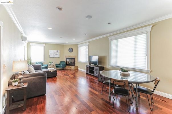 Dining room, Fireplace, Interior, Living room, Recessed Lighting, Wood Texture Flooring