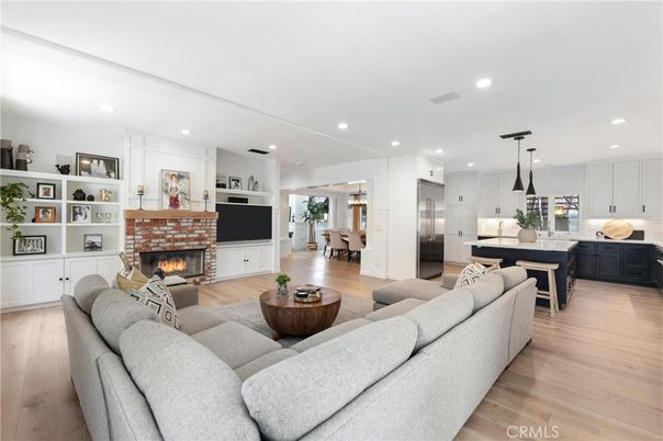 Dining room, Fireplace, Interior, Kitchen, Living room, Pendant Lights, Recessed Lighting, Stainless Steel Appliances, Wood Texture Flooring