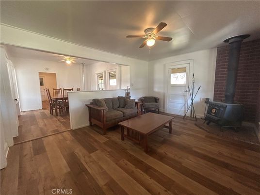 Dining room, Fireplace, Interior, Living room, Stone Walls, Wood Texture Flooring