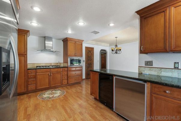 Chandelier, Interior, Kitchen, Recessed Lighting, Stainless Steel Appliances, Wood Texture Flooring
