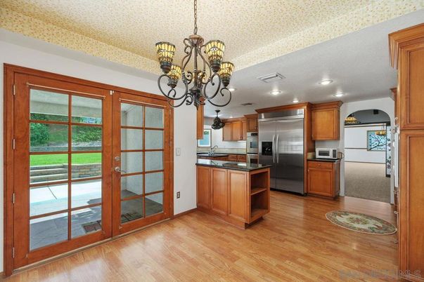 Chandelier, Interior, Kitchen, Recessed Lighting, Stainless Steel Appliances, Wood Texture Flooring