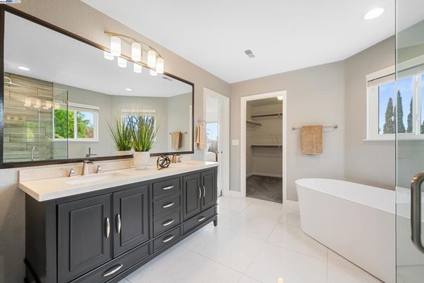 Bathroom, Dual Sink Vanities, Free Standing Baths, Glass Shower, Interior, Recessed Lighting, Walk-in Closets