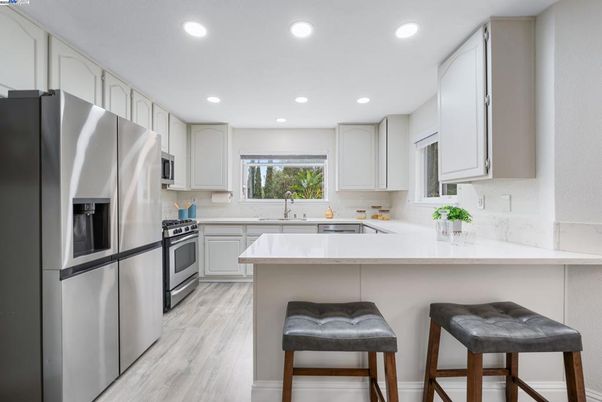 Interior, Kitchen, Recessed Lighting, Stainless Steel Appliances, Wood Texture Flooring