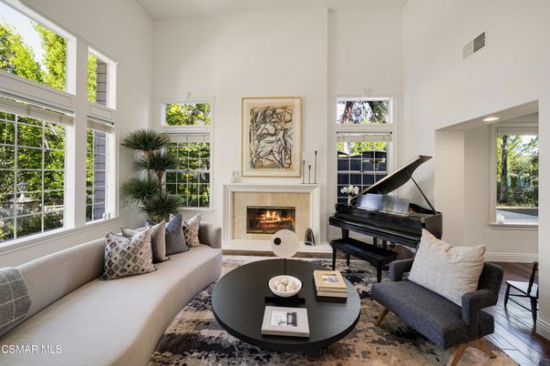 Fireplace, Interior, Living room, Piano, Recessed Lighting, Wood Texture Flooring