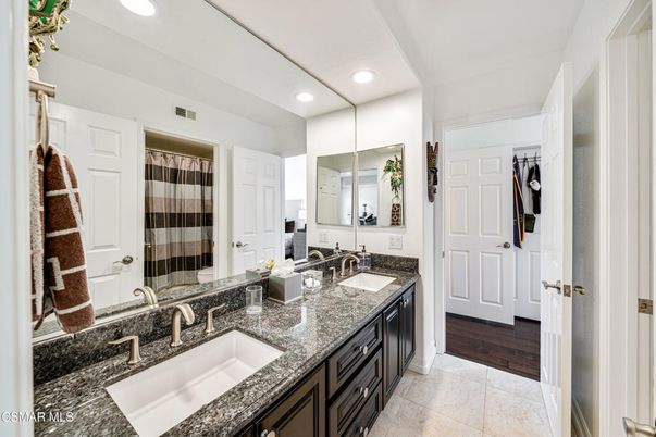 Bathroom, Dual Sink Vanities, Interior, Recessed Lighting, Wood Texture Flooring
