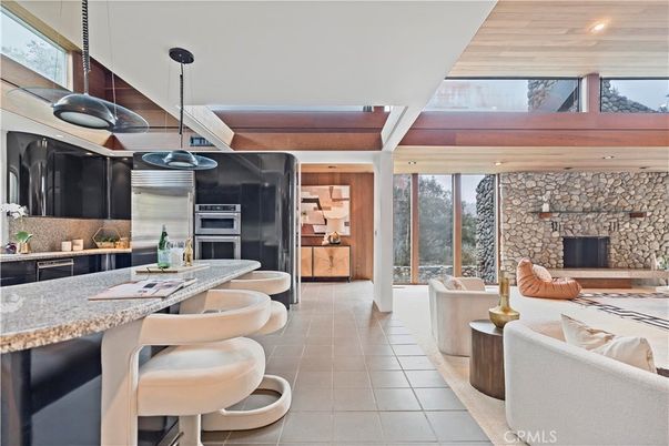 Fireplace, Interior, Kitchen, Pendant Lights, Recessed Lighting, Stainless Steel Appliances, Stone Walls