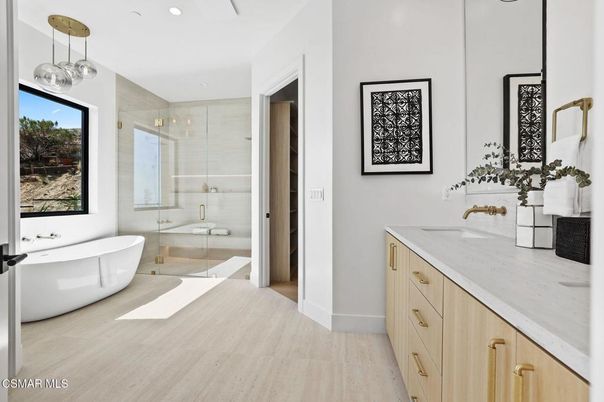 Bathroom, Dual Sink Vanities, Free Standing Baths, Glass Shower, Interior, Pendant Lights, Recessed Lighting, Wood Texture Flooring