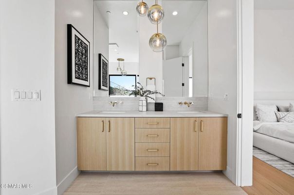 Bathroom, Dual Sink Vanities, Interior, Pendant Lights, Recessed Lighting, Wood Texture Flooring