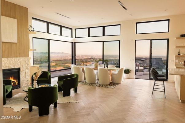 Dining room, Fireplace, Interior, Living room, Recessed Lighting, Water, Wood Texture Flooring