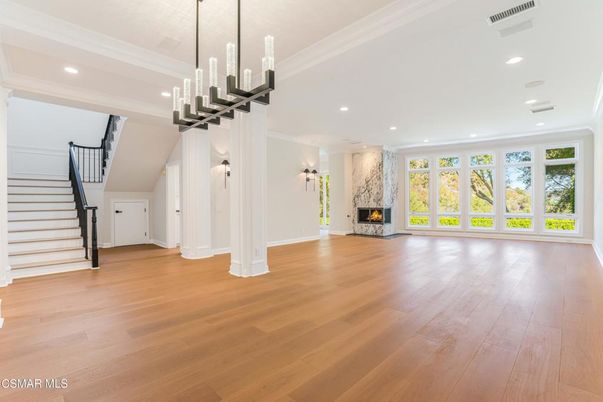 Empty room, Fireplace, Interior, Pendant Lights, Recessed Lighting, Wood Texture Flooring