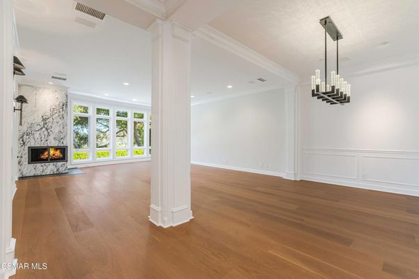 Empty room, Fireplace, Interior, Pendant Lights, Recessed Lighting, Wood Texture Flooring