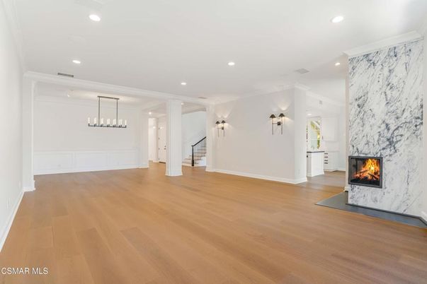 Empty room, Fireplace, Interior, Pendant Lights, Recessed Lighting, Wood Texture Flooring