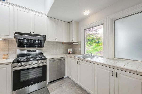Interior, Kitchen, Stainless Steel Appliances, Tile Countertops