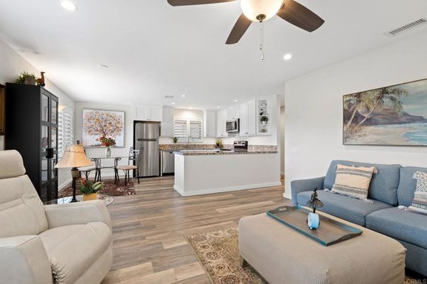 Dining room, Interior, Kitchen, Living room, Recessed Lighting, Stainless Steel Appliances, Wood Texture Flooring