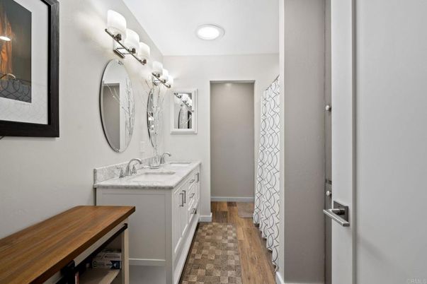 Bathroom, Dual Sink Vanities, Interior, Recessed Lighting, Wood Texture Flooring