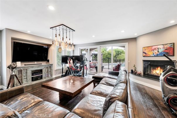Dining room, Fireplace, Interior, Living room, Pendant Lights, Recessed Lighting, Wood Texture Flooring